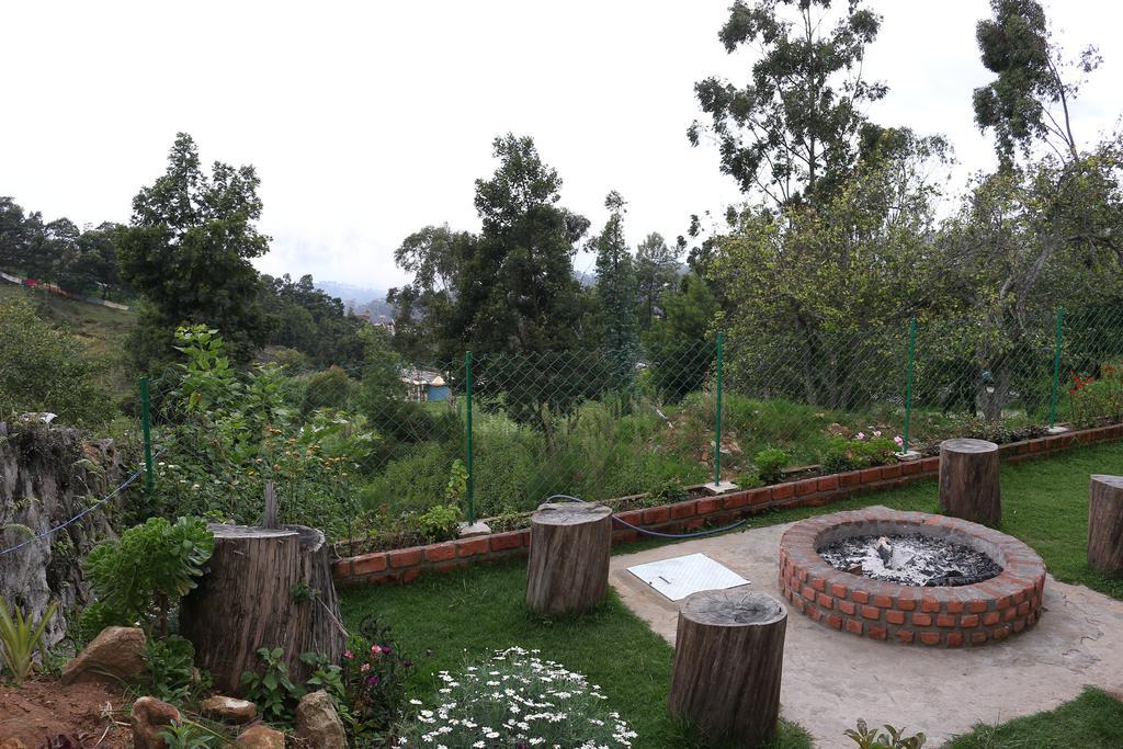 Adhithya Holidays Kodaikanal Phòng bức ảnh